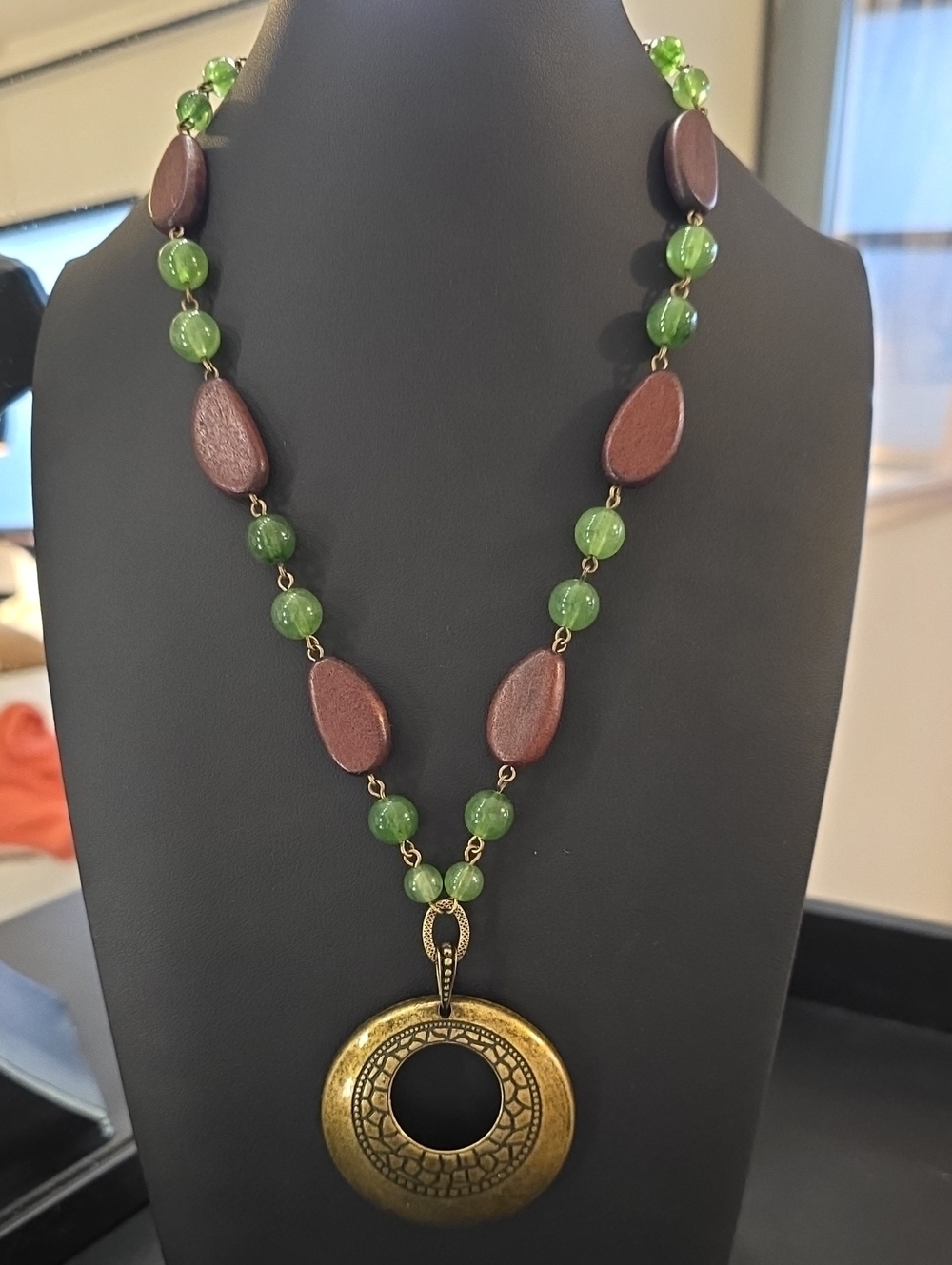 Hand Crafted Green and Brown Beaded Necklace with Gold Pendant